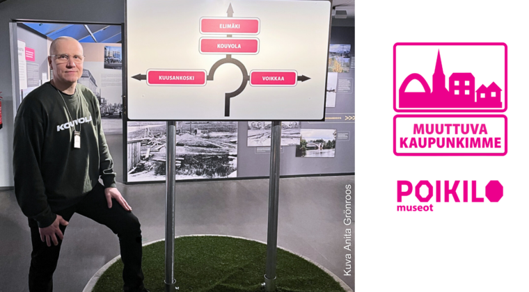 Valokuva Muuttuva kaupunkimme -näyttelystä. Kuvassa Opas Hannu Purho.